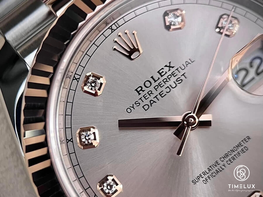 Biểu tượng vương miện đồng hồ Rolex trên đồng hồ Rolex thật 